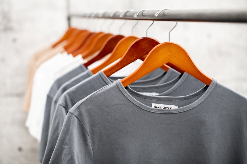 A rack of premium cotton t-shirts created at In House, Canada. 